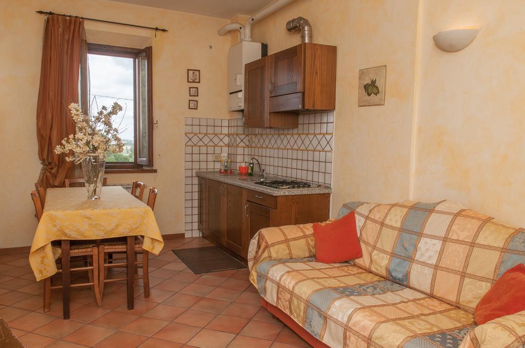 Apartmán Residenza Il Palazzo Castiglione del Lago Pokoj fotografie