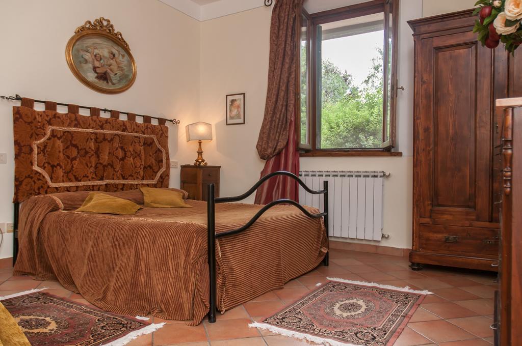 Apartmán Residenza Il Palazzo Castiglione del Lago Pokoj fotografie